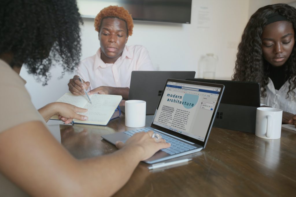 Women-typing-on-computer-software-proposal